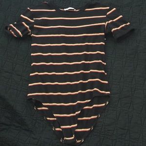 Black t-shirt bodysuit with red and white stripes